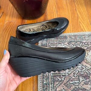 Fly London Yoko Slip On Black Heeled Wedges